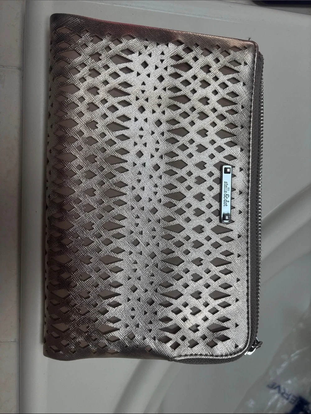 Stella & Dot Metallic Silver Laser-Cut Zip Clutch